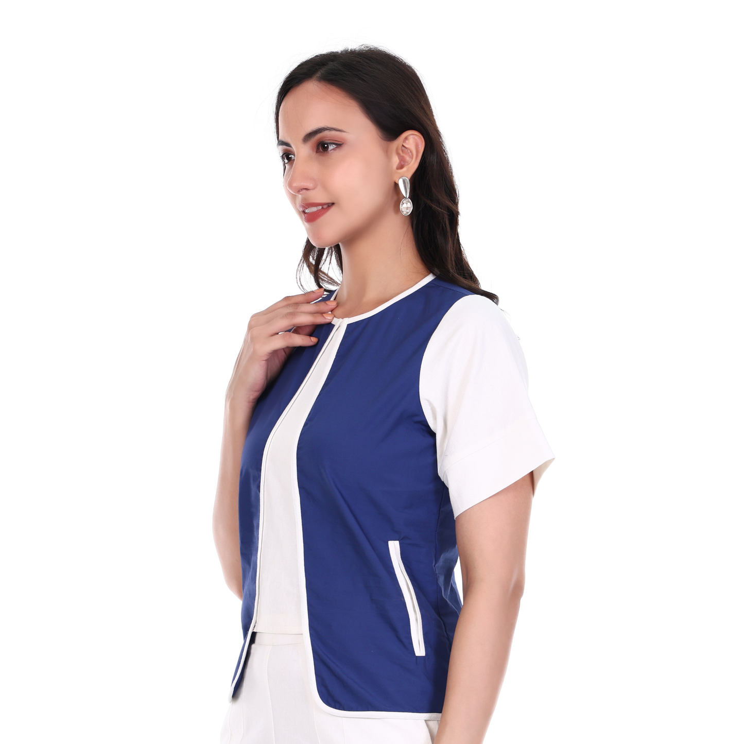Woman wearing a blue and white top on a white background