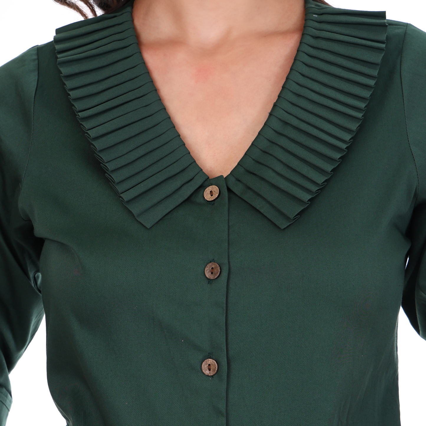 Green blouse with a pleated collar and wooden buttons